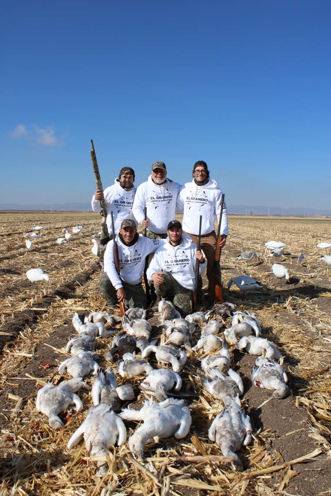 El Granero crew in branded hoodies, snow goose limit